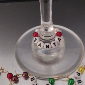 Set of 11 Different Christmas/ Reindeer & Santa's themed Wine Glass Charms